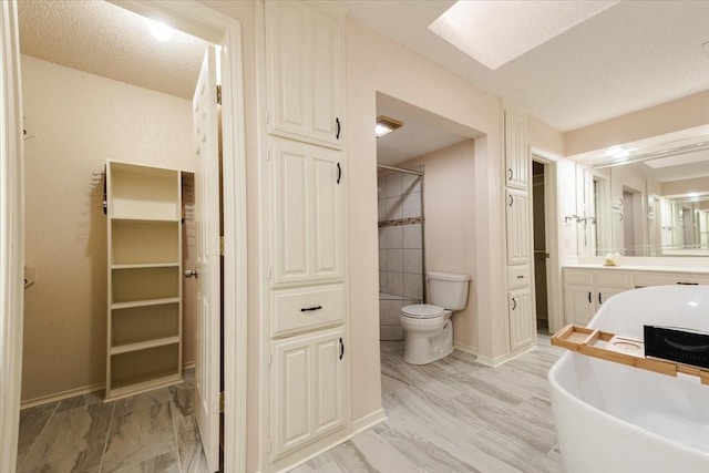 1115 Shady Oak Trl, Mansfield, TX 76063 - bathroom featuring a closet, vanity, a soaking tub, and a tile shower