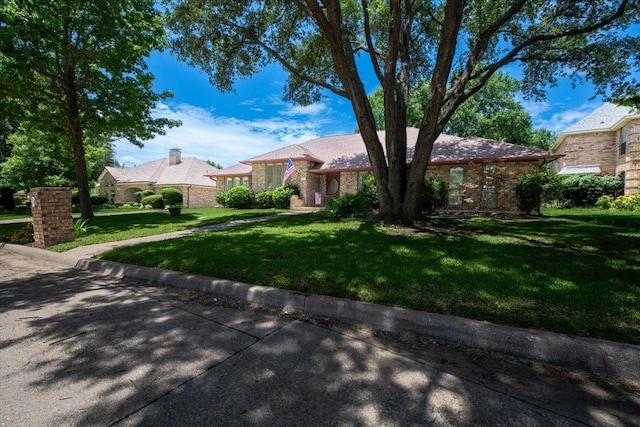 1115 Shady Oak Trl, Mansfield, TX 76063 - view of front of property with a front yard