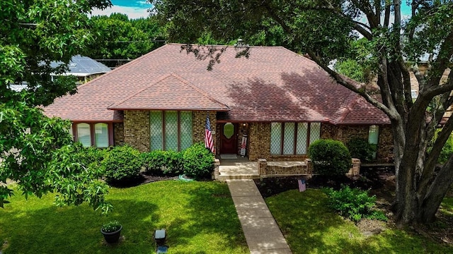 1115 Shady Oak Trl, Mansfield, TX 76063 - english style home with a front lawn and a shingled roof