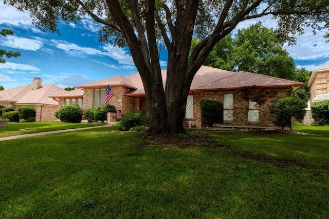 1115 Shady Oak Trl, Mansfield, TX 76063 - single story home featuring a front yard and brick siding