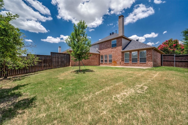 7851 Quiet Meadow Ln, Frisco, TX 75033 - rear view of property featuring a fenced backyard, brick siding, a chimney, and a shingled roof