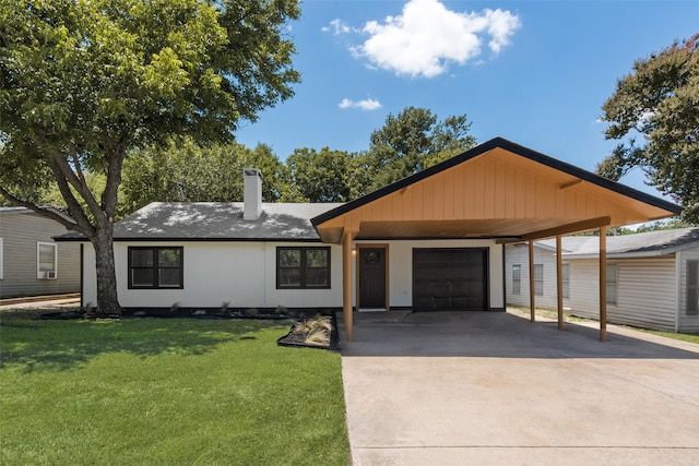 524 Browning Dr, Arlington, TX 76010 - view of front of property featuring an attached garage, concrete driveway, a front yard, and a chimney