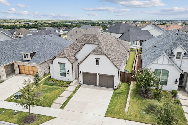 1713 Purple Thistle Ln, Fort Worth, TX 76008 - view of front facade featuring a residential view, a garage, driveway, and roof with shingles