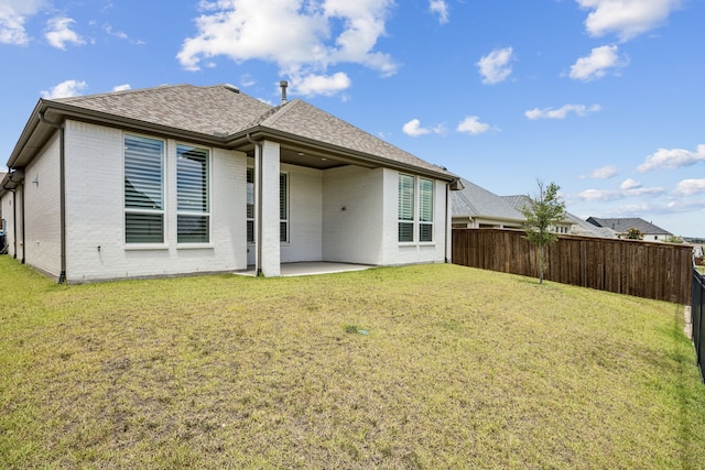 1713 Purple Thistle Ln, Fort Worth, TX 76008 - rear view of property featuring brick siding, a patio, a fenced backyard, and roof with shingles