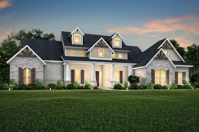 230 Olson Rd, Waxahachie, TX 75167 - view of front of property featuring a lawn, stone siding, and covered porch