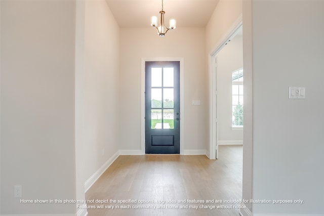 230 Olson Rd, Waxahachie, TX 75167 - entrance foyer featuring wood finished floors and a chandelier