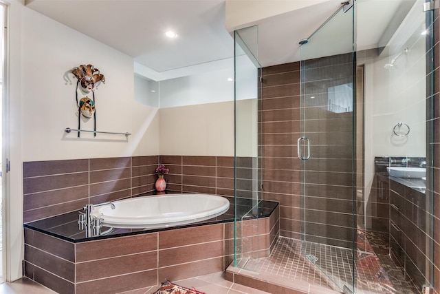 2600 W 7th St Unit 1417, Fort Worth, TX 76107 - full bathroom featuring a garden tub and a stall shower