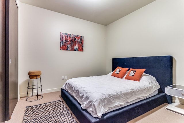 2600 W 7th St Unit 1417, Fort Worth, TX 76107 - bedroom with carpet floors and baseboards