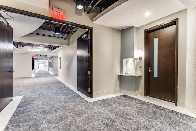 2600 W 7th St Unit 1417, Fort Worth, TX 76107 - hall with tile patterned flooring and baseboards