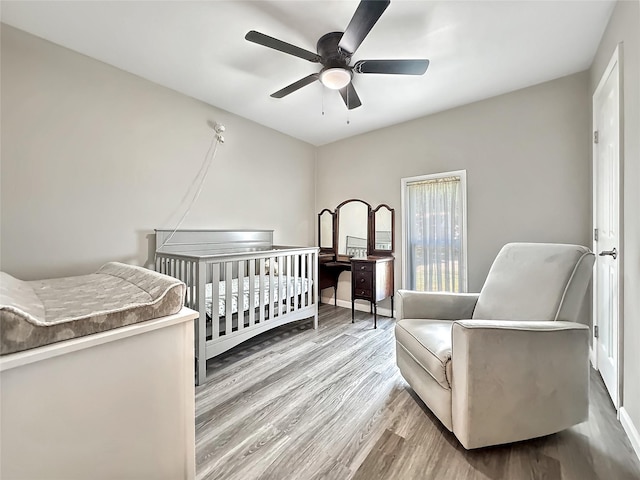 900 Shenandoah Dr, Plano, TX 75023 - bedroom with wood finished floors and a ceiling fan