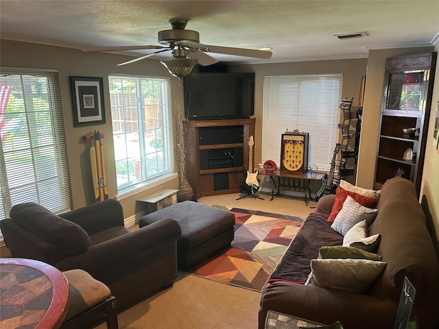 625 N Bailey Ave, Fort Worth, TX 76107 - living room featuring a ceiling fan and ornamental molding