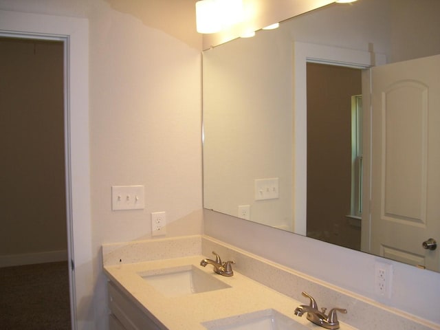 1119 W Johnson St, Denison, TX 75020 - bathroom featuring double vanity