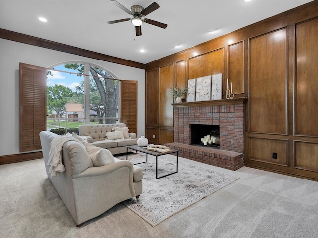 4029 Tumbril Ln, Plano, TX 75023 - living room with ceiling fan, light carpet, a brick fireplace, recessed lighting, and wooden walls