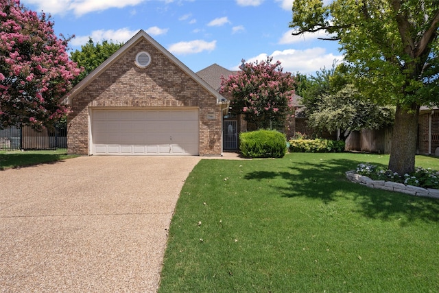 7501 Bunker Ct, Benbrook, TX 76126 - view of front of home featuring brick siding, driveway, and a garage