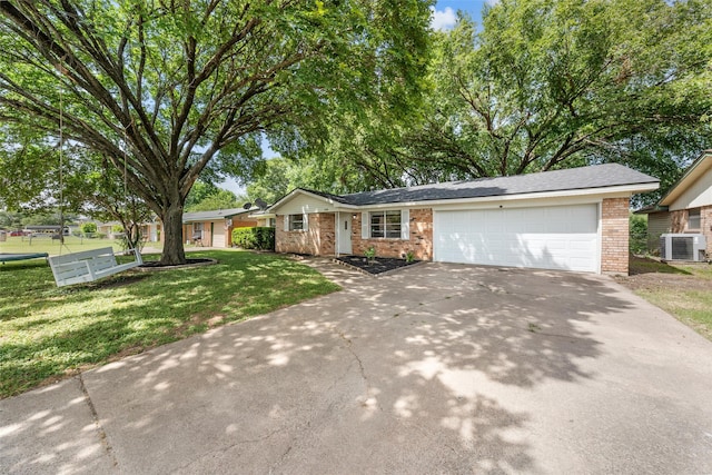 210 Virginia Dr, Waco, TX 76705 - ranch-style house featuring a garage, concrete driveway, brick siding, and a front lawn