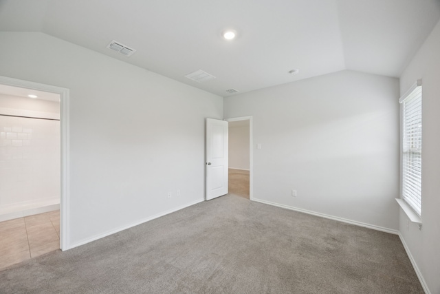 124 Greengate Dr, Boyd, TX 76023 - unfurnished bedroom featuring lofted ceiling, carpet, and multiple windows