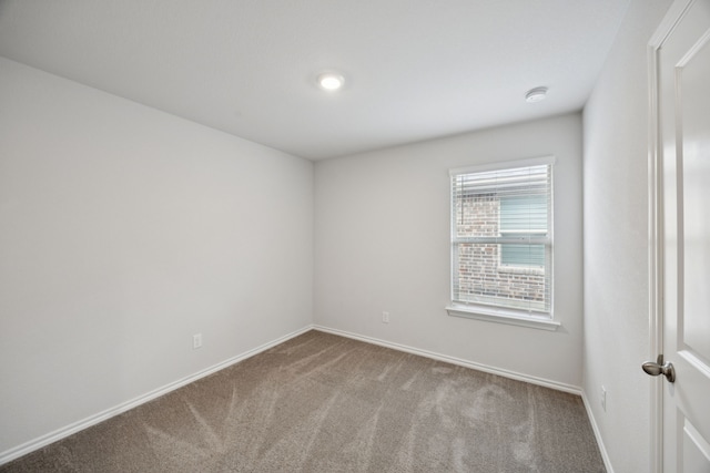 124 Greengate Dr, Boyd, TX 76023 - carpeted empty room with a smoke detector and baseboards