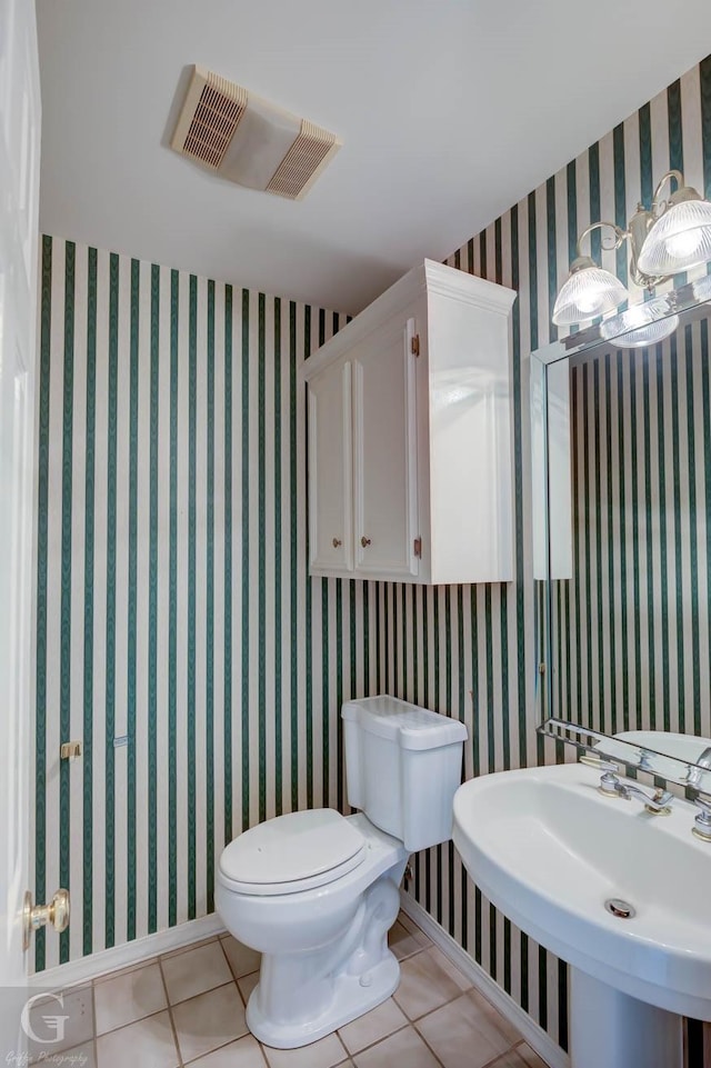 8 Sterling Ranch Rd N, Haughton, LA 71037 - bathroom featuring toilet and tile patterned floors