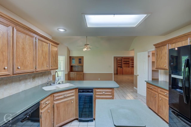 8 Sterling Ranch Rd N, Haughton, LA 71037 - kitchen featuring black appliances, a peninsula, lofted ceiling, light tile patterned floors, and decorative backsplash