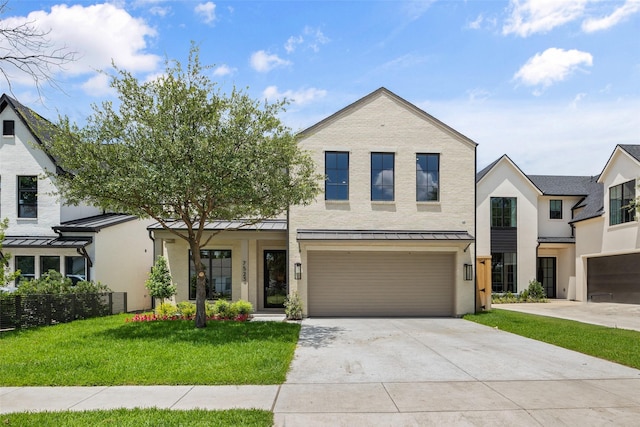 7523 Robin Rd, Dallas, TX 75209 - view of front of house with a standing seam roof, driveway, a front yard, a garage, and a metal roof