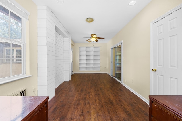 3315 Curry Rd, Arlington, TX 76001 - corridor with built in shelves and dark wood finished floors