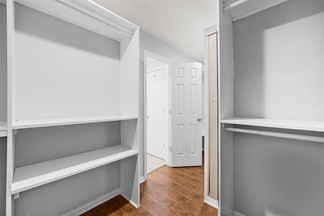 3315 Curry Rd, Arlington, TX 76001 - spacious closet featuring wood finished floors