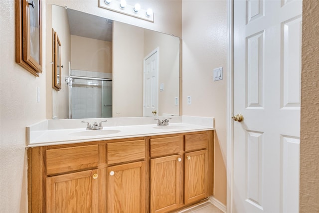 7012 Hillshire Ln, Sachse, TX 75048 - full bath featuring double vanity and a shower with shower door