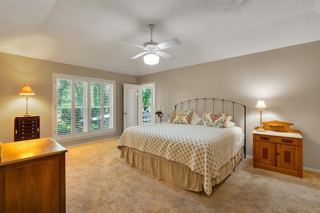 2815 Whisperwood Trl, Dalworthington Gardens, TX 76016 - bedroom with light carpet, a textured ceiling, and ceiling fan