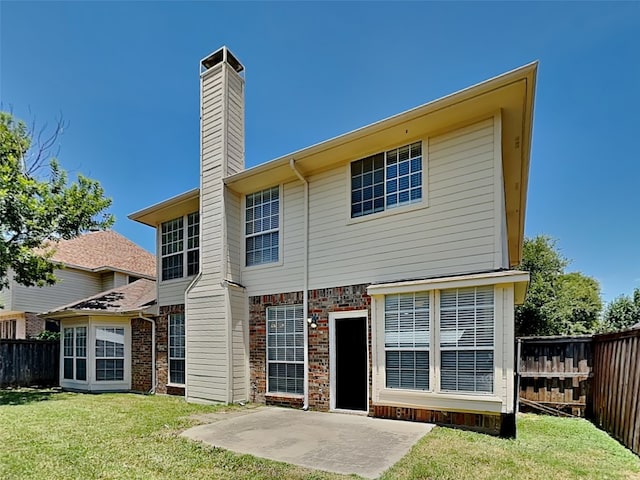 2829 Alcot Ln, Grand Prairie, TX 75052 - rear view of house with a chimney, a patio, and brick siding