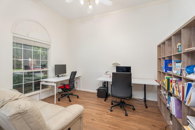 8479 Firewheel Ln, Frisco, TX 75036 - office area featuring ceiling fan, ornamental molding, and wood finished floors