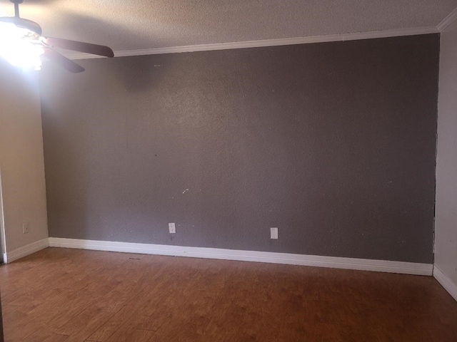 734 Sceptre Cir, Garland, TX 75043 - empty room with ceiling fan, crown molding, wood finished floors, and a textured ceiling