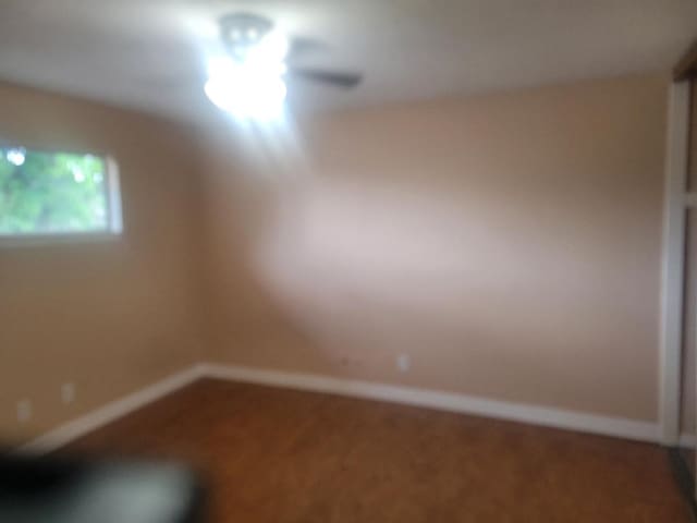 734 Sceptre Cir, Garland, TX 75043 - carpeted spare room with baseboards
