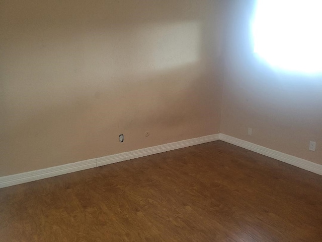 734 Sceptre Cir, Garland, TX 75043 - spare room with baseboards
