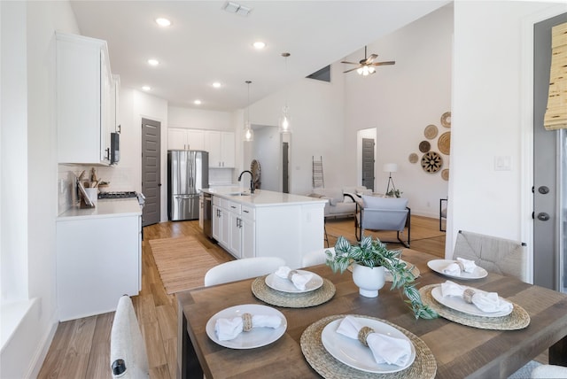 1604 Berry Ridge Trl, Aubrey, TX 76227 - dining room featuring a ceiling fan, light wood-style flooring, and recessed lighting