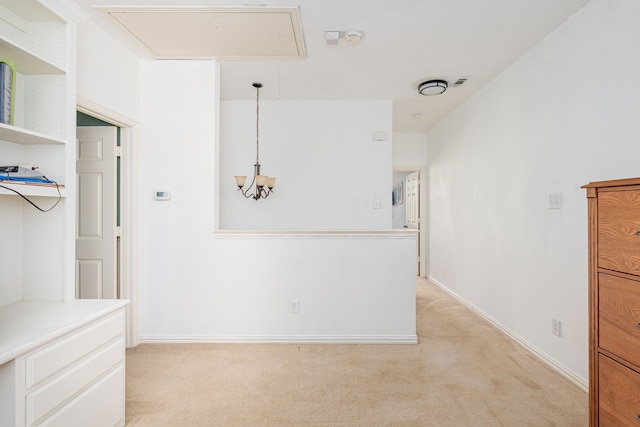 11116 Elizabeth Ave, Frisco, TX 75035 - empty room with attic access, light carpet, and a chandelier