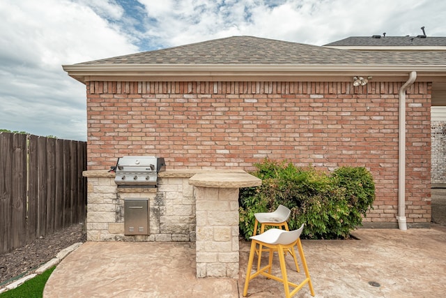 11116 Elizabeth Ave, Frisco, TX 75035 - view of patio with an outdoor kitchen