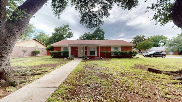 1550 Pamela Ln, Fort Worth, TX 76112 - single story home featuring brick siding and a front lawn