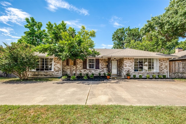 6342 E Lovers Ln, Dallas, TX 75214 - single story home featuring brick siding