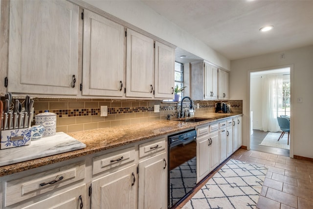 6342 E Lovers Ln, Dallas, TX 75214 - kitchen with dishwasher, decorative backsplash, plenty of natural light, recessed lighting, and light stone countertops