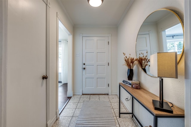 6342 E Lovers Ln, Dallas, TX 75214 - entrance foyer featuring crown molding and light tile patterned flooring