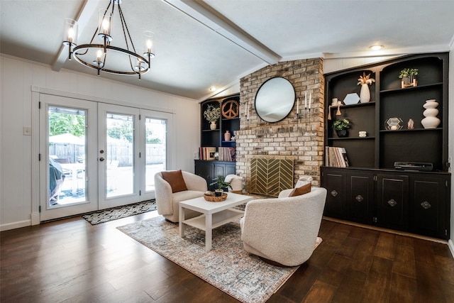 6342 E Lovers Ln, Dallas, TX 75214 - living area featuring french doors, a chandelier, a fireplace, and dark wood finished floors