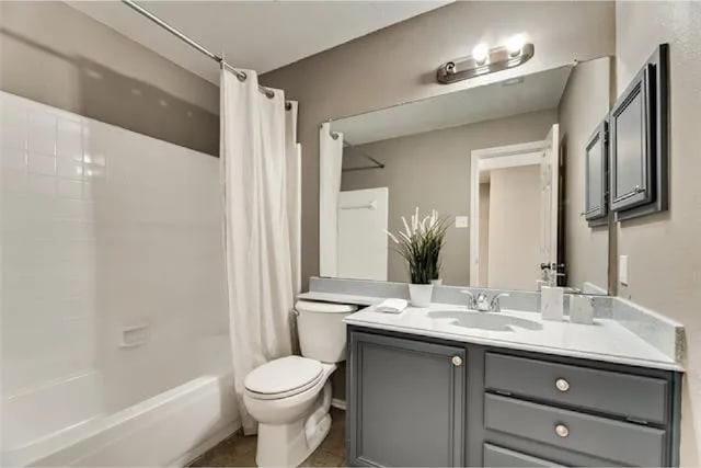 4914 Redwater Dr, Arlington, TX 76018 - bathroom featuring vanity, shower / tub combo, and tile patterned flooring
