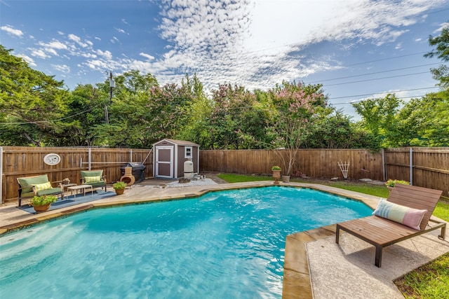 128 Timber Ridge Dr, Murphy, TX 75094 - view of pool featuring a storage shed, a fenced backyard, and a patio area