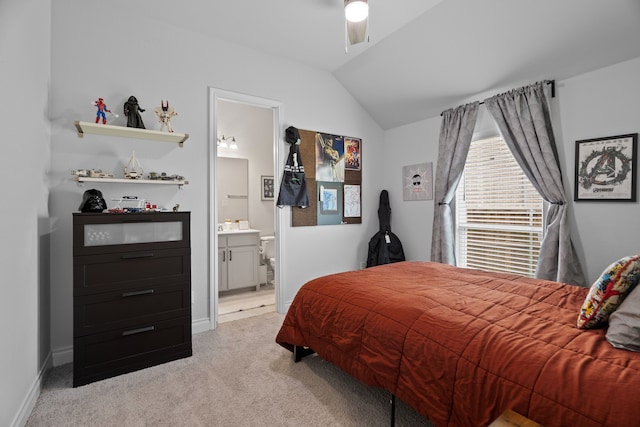 3700 Blue Stream Dr, Little Elm, TX 75068 - bedroom with vaulted ceiling, light carpet, connected bathroom, and ceiling fan