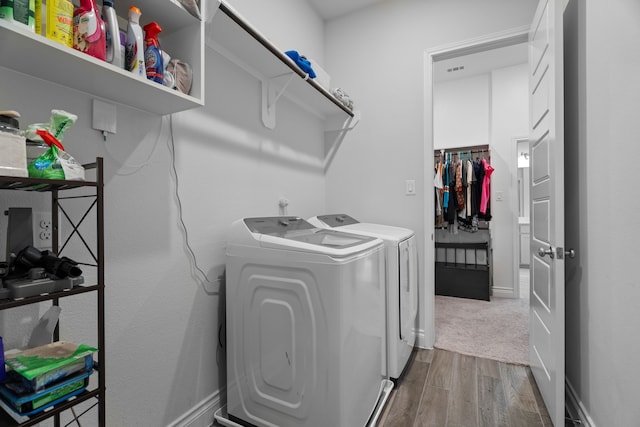3700 Blue Stream Dr, Little Elm, TX 75068 - laundry area featuring independent washer and dryer and wood finished floors