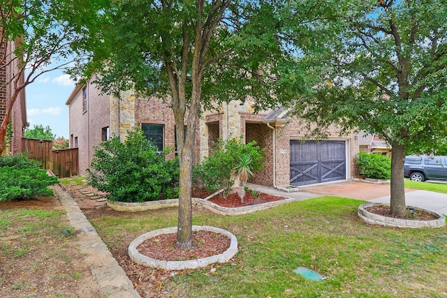 1009 Chickasaw Dr, Carrollton, TX 75010 - view of front of house featuring concrete driveway, brick siding, and a garage