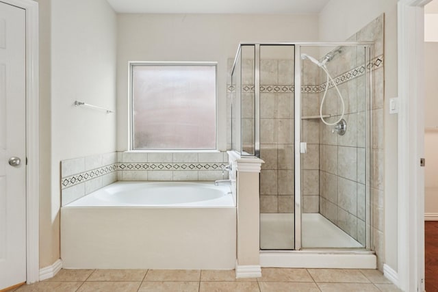 1009 Chickasaw Dr, Carrollton, TX 75010 - bathroom featuring tile patterned flooring, a stall shower, and a garden tub