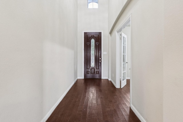 1009 Chickasaw Dr, Carrollton, TX 75010 - entrance foyer with wood finished floors and a high ceiling