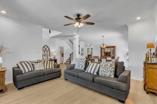 3252 Shady Glen Dr, Grapevine, TX 76051 - living room with stairs, ceiling fan, light wood-style floors, ornamental molding, and recessed lighting