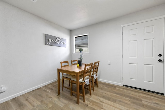 1830 San Antonio St, Grand Prairie, TX 75051 - dining space featuring light wood-style flooring